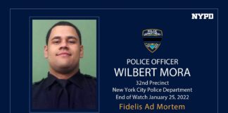 Una foto del NYPD, en tributo al joven policía Wilbert Mora, fallecido luego de recibir disparos en Harlem.